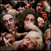 oxfordtweed: A large group of zombies reaches toward the camera (Zombies - Swarm)