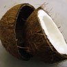 pinesandmaples: A brown coconut halved with the inner shell visible. (theme: cracked)