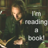 dragonfly: Ichabod Crane leafing through books (SH reading a book)