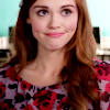 lydiascreams: (mock smile pursed lips stare neutral)