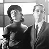 turlough: b/w photo of young man and woman in 1950s dress, Drusilla & Spike from 'Buffy the Vampire Slayer' ((buffy) sophistication)