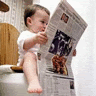 yeuxdebleu: Baby on toilet reading newspaper (Reading Baby on toilet with newspaper)