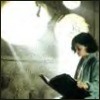 anonymous_sibyl: A young girl reading a  very large book in a ray of light. (Ofelia)