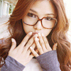 amihan: model with long brown hair wearing eyeglasses, with both hands covering lips ([fashion] glasses)