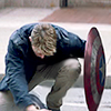 lonelywalker: Captain America in civvies, hiding behind his shield (captain america: shield)