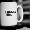 forthwritten: a black and white photo of a white mug with "fucking tea" wriiten on it in small capital letters (fucking tea)