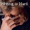 thothmes: Jack O'Neill, head down, pen held by forehead.  Legend: Writing is Hard (Writng Is Hard!)