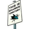 james: A traffic sign saying This is sharks territory. (hockey_sharks_territory)