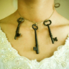 nextian: A woman in a Victorian dress with three old keys around her neck. (eyai)