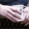 mrkinch: Sean holding a fluted teacup in both hands (tea)