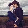 jelazakazone: Jamie and Claire facing each other, Jamie clenching her skirt in his hand (outlander)