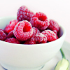 ellia: white bowl piled high with raspberries (raspberries)