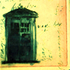 wintergrey: Blue ink on yellow paper, a sketch of a police box with incomprehensible script around it. (TARDIS: bigger on the inside.)