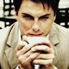 iamshadow: John Barrowman cradling a cup of coffee possessively (Coffee)