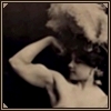 rydra_wong: 19th-C strongwoman and trapeze artist Charmion flexes her biceps while wearing a marvellous feathery hat (strength -- strongwoman)