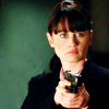 skieswideopen: Teresa Lisbon against a green background, aiming a gone (Mentalist: Lisbon with gun)