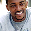 longwhitecoats: Sam Wilson smiling, wearing his jogging clothes (Sam smiling)