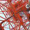 down: A view of the orange strutwork of Tokyo Tower from below (Tower)