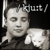 larissabernstein: Marlon Brando cuddling with white cat; caption / kjuːt / (Brando with cat)
