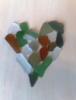 snickets: A heart created from green, brown and clear sea glass. (Default)