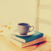 invisibleworld: A stack of books with a coffee cup on top. (coffee & books)