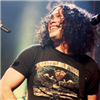 anoneknewmoose: man with curly hair grinning big (bandom - mcr ray has the BEST SMILE)