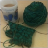 ambersweet: A green sock on the needles. (Nutkin socks)