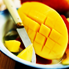 gavagai: A mango being sliced (mango!)