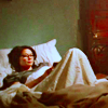 anaraine: Joan Watson reclining in bed, reading a book before bed. ([elementary] reading in bed)