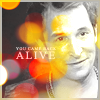 tinny: Flynn Carsen from the Librarians smiling with yellow spotlights "You came back alive" (librarians_flynn lights you came back al)