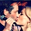 wendelah1: David and Gillian kissing at his concert (At Last)