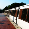 annalee: A metro train at the platform on a sunny day. (Metro Sunny)