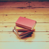 alwayswondered: A stack of books on a wooden floor. (No friend as loyal as a book.)
