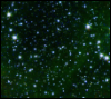 across_space_and_time: A dense scattering of stars set on a bottle-green backdrop (Default)