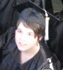 aedifica: Photo of me looking up from among a crowd of my fellow graduates. (Graduation)