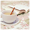 bedlamsbard: miscellaneous: cup of tea and an open book (perfect (pretty_pixels))
