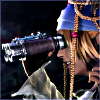 stealth_noodle: RIkku peering through binoculars with keen interest. (rikku)