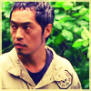 gloss: annoyed man squinting off-frame (Lost: Miles van)