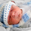 recessional: a newborn baby in a blue-and-white striped knitted hat and scarf (personal; TINY ADORABLE PERFECTION)