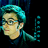 dreamtofbeing: The tenth Doctor, wearing specs, looking interested/mellow. Captioned with "doctor". (still the doctor)
