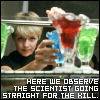 ct: SG-1: Sam reaching for blue jello. Text: Here we observe the scientist going straight for the kill. (SG1: sam jello)