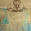 meroure: glass chandelier and maps (remind me of the place i am)