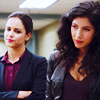 monanotlisa: Amy Santiago and Rosa Diaz in their Detective suits, mostly frontal, smiling (Santiago & Diaz - b99)