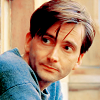 dreamtofbeing: David Tennant in Single Father, looking sideways, smiling. (i'm totally listening)